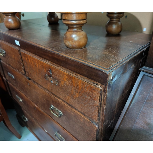 611 - An 18th century oak chest of 3 long and 2 short drawers, on bracket feet (later handles)