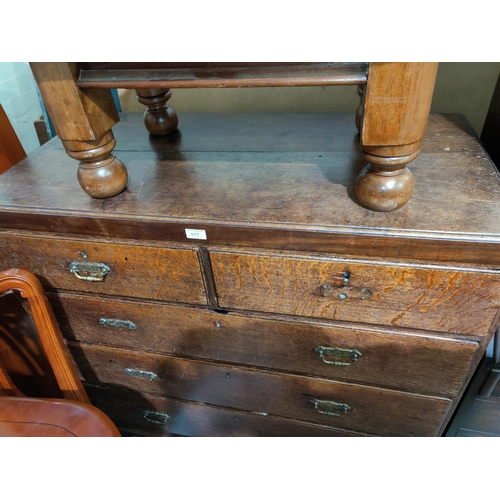 611 - An 18th century oak chest of 3 long and 2 short drawers, on bracket feet (later handles)