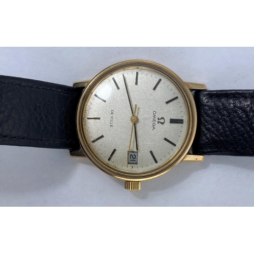 322 - A yellow metal cased 1960's / 70's Omega DeVille wristwatch with champagne dial, baton numerals and ... 