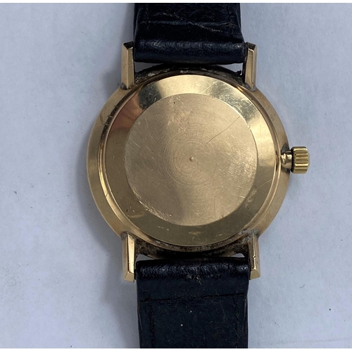 322 - A yellow metal cased 1960's / 70's Omega DeVille wristwatch with champagne dial, baton numerals and ... 