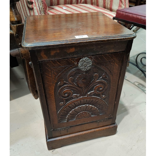 528 - An Edwardian carved coal bin with fall front; a mahogany box seat piano stool