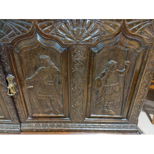 530 - An Edwardian buffet sideboard with carved decoration comprising 2 cupboards over 2 drawers and doubl... 