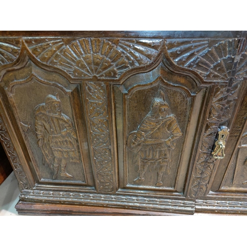 530 - An Edwardian buffet sideboard with carved decoration comprising 2 cupboards over 2 drawers and doubl... 