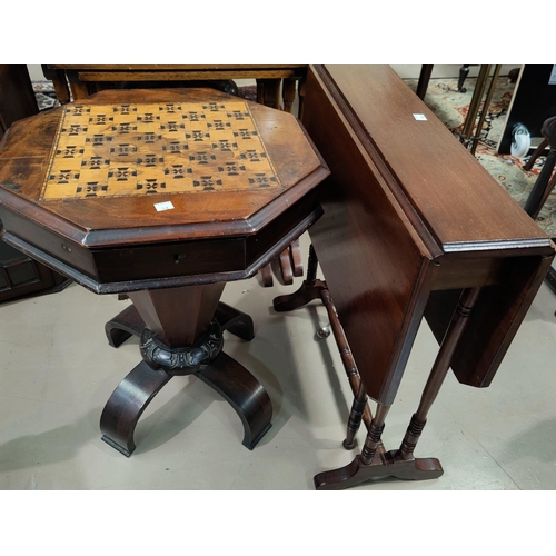 533 - A Victorian inlaid oak octagonal box (reduced); an Edwardian mahogany Sutherland table