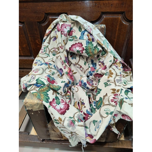 618 - A 1930's child's club armchair in floral chintz