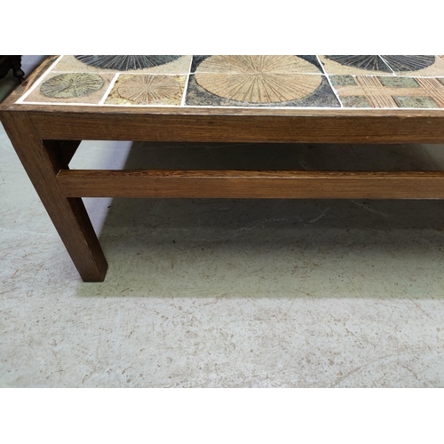 623 - A Danish mid 20th century designer coffee table  in dark hardwood with tiles by Tue Poulsen, frame b... 