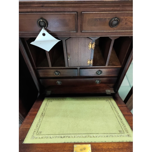 643 - A reproduction mahogany secretaire on chest, with fall front and fitted interior, 4 drawers below