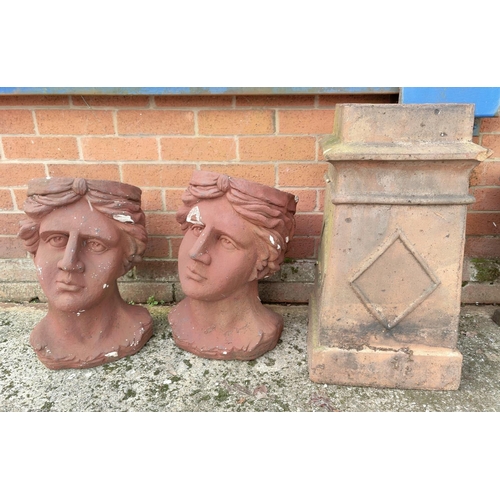2 - A chimney pot and two large resin planters in the form of heads