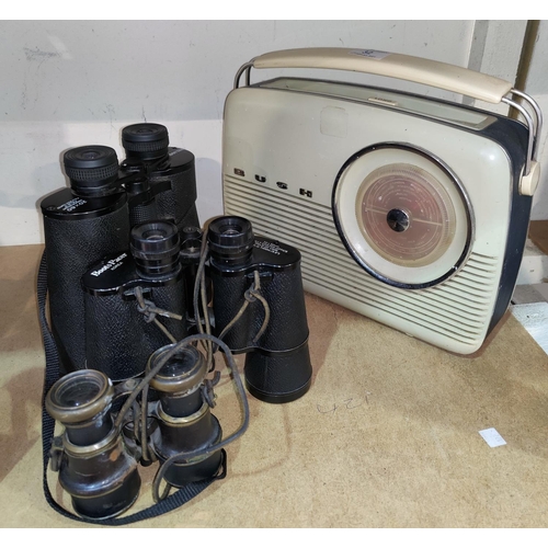 32 - Three sets of binoculars and a vintage Bush radio