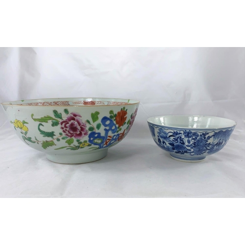 136b - A 19th century Chinese famille rose bowl decorated with flowers, diameter 23cm, hairline crack and a... 