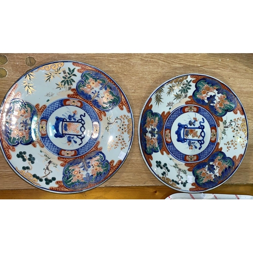 185 - A pair of Japanese Imari plaques, diameter 31cm