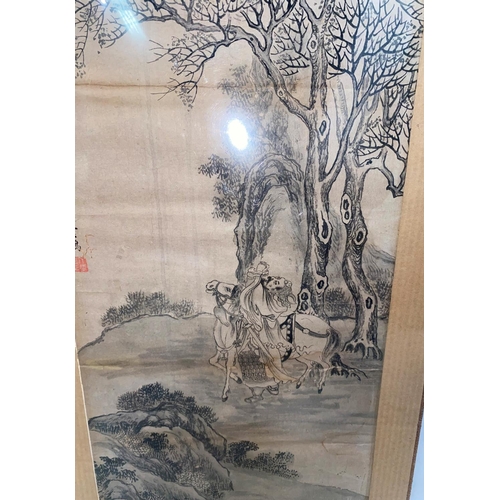 186 - A Chinese painting of man on horse back surrounded by trees etc with character marks and red seam ma... 