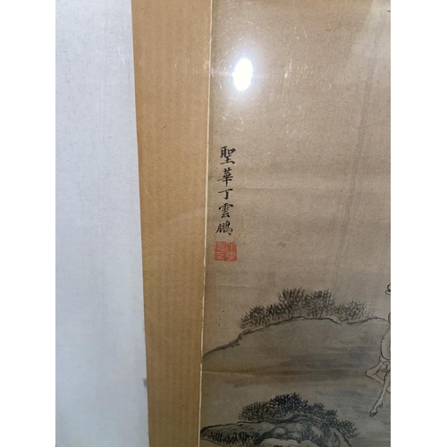 186 - A Chinese painting of man on horse back surrounded by trees etc with character marks and red seam ma... 