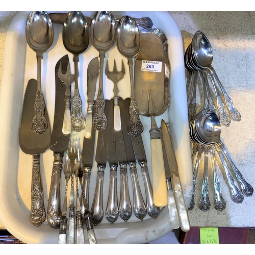 283 - A selection of EPNS King's Pattern cutlery, items with mother of pearl handles, a crumb scoop etc, a... 