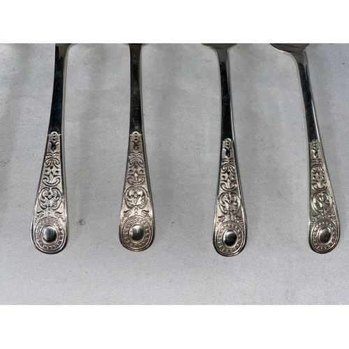 406 - A set of 6 teaspoons with ornate embossed decoration, Sheffield 1911, maker W S Savage, 3.5oz. / 109... 