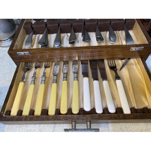 362 - A 1930's part canteen of cutlery in oak box; silver plate