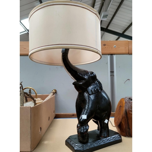 85 - A large ebonised elephant table lamp