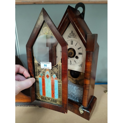 86 - A 19th century American mantel clock in arch top mahogany case; a 1930's chiming mantel clock