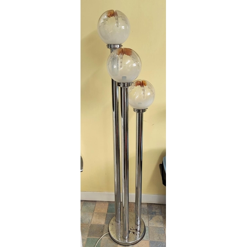 132A - An Italian mid century chrome three height standard lamp in the manner of Mazzega with shaped glass ... 