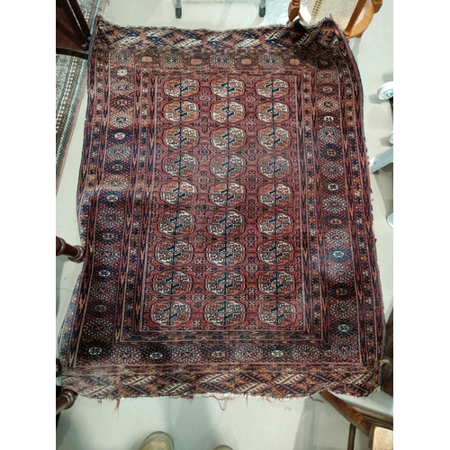 486 - A modern Bokhara style rug, hand knotted with rust ground, length 160 cm; a mid 20th century hand kn... 