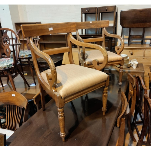 515 - A Regency mahogany set of 7 (5 + 2) dining chairs on turned legs, with brown fabric drop in seats