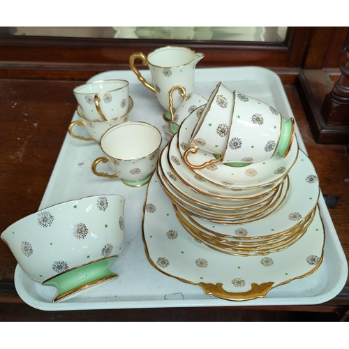 230A - A 1930's green spotted part tea service