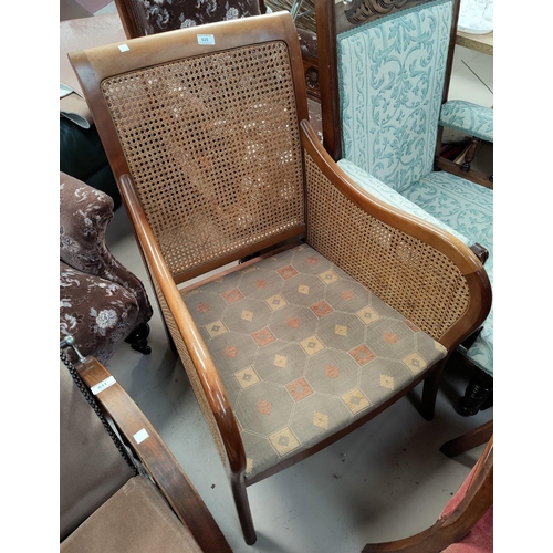 625 - A period style armchair with bergère caning