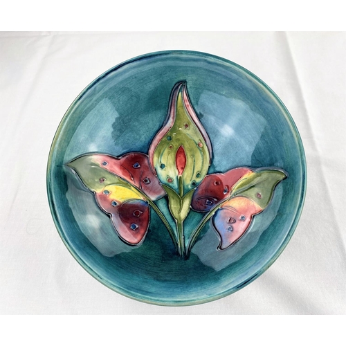 10 - A circular Moorcroft dish decorated with a Lily flower & leaves, signed and impressed diameter 17cm