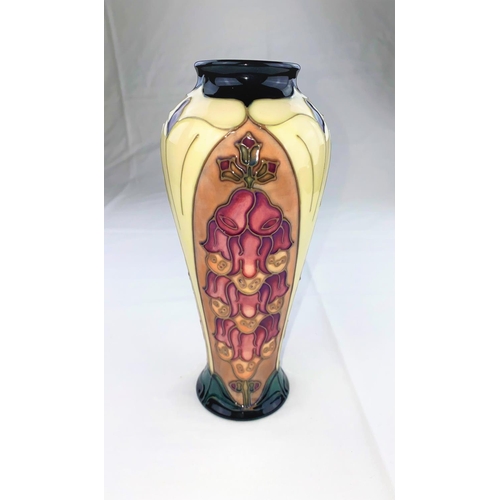13 - A Moorcroft vase of tapering form decorated in the Foxglove pattern designed by Rachel Bishop impres... 