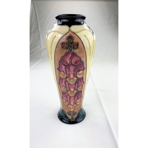 13 - A Moorcroft vase of tapering form decorated in the Foxglove pattern designed by Rachel Bishop impres... 