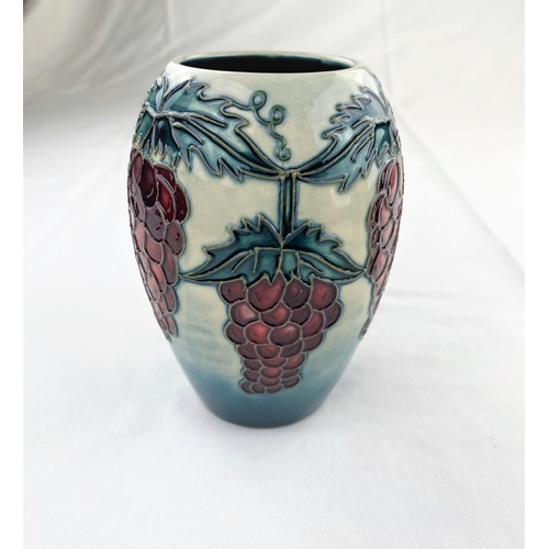 17 - A Moorcroft vase of ovoid form decorated with a grapevine impressed & monogrammed  height 13.5cm