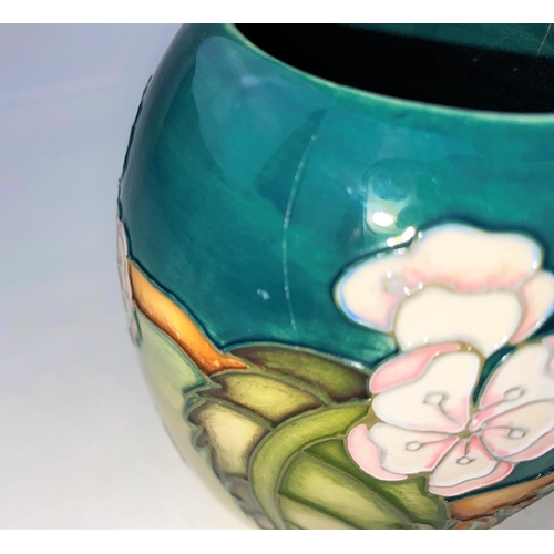 18 - A Moorcroft vase of ovoid form decorated with cherries & white flowers, designed by D.J. Hancock,  i... 