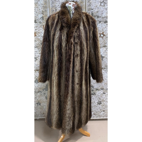 234 - A heavy full length Raccoon fur coat