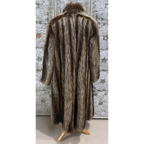 234 - A heavy full length Raccoon fur coat