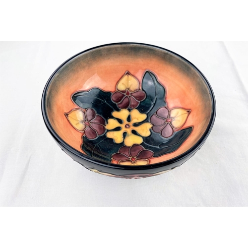 25 - A Moorcroft bowl decorated in the Honeysuckle & Dog Rose pattern on circular foot  impressed & monog... 