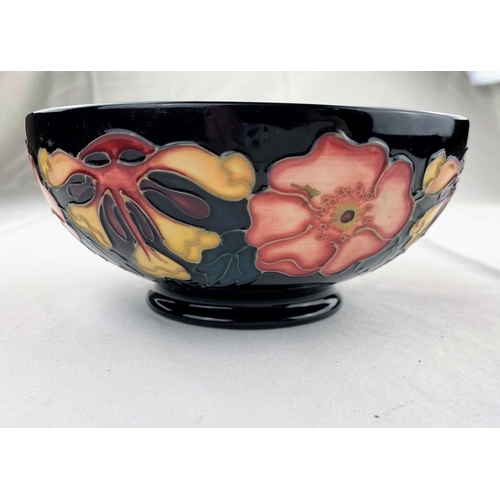 25 - A Moorcroft bowl decorated in the Honeysuckle & Dog Rose pattern on circular foot  impressed & monog... 
