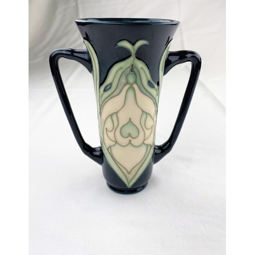 30 - A Moorcroft tapering 2 handled vase decorated in the 