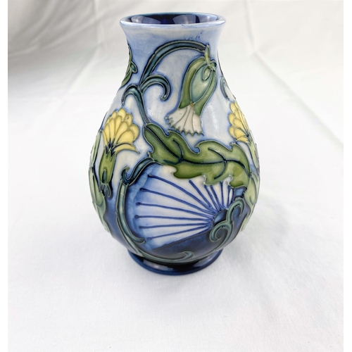 31 - A Moorcroft baluster vase decorated with yellow & white flowers impressed & monogrammed height 13.5c... 