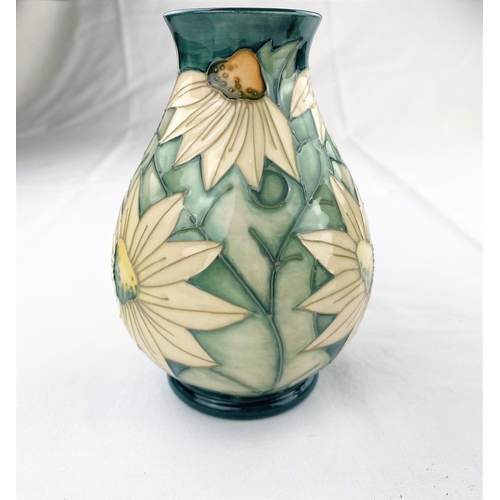32 - A Moorcroft baluster vase decorated with white star shaped flowers impressed & monogrammed height 13... 