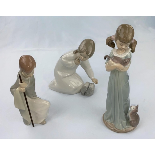 51 - Three Lladro figures, kneeling girl with slippers, girl with kittens & boy with staff