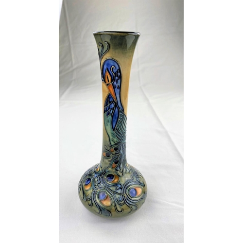 9 - A Moorcroft vase with squat body & tall slender neck decorated with a peacock impressed & monogramme... 