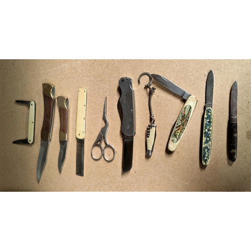 133 - A Georgian silver & tortoiseshell penknife & other penknives & a beard comb