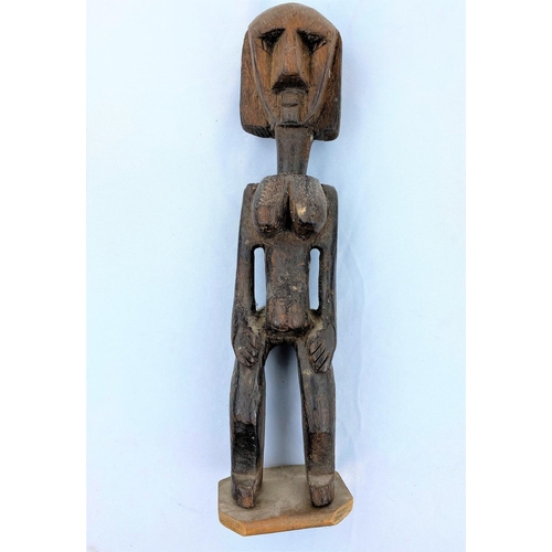 171 - An African tribal (carved) wood female figure, black stained finish, 34cm