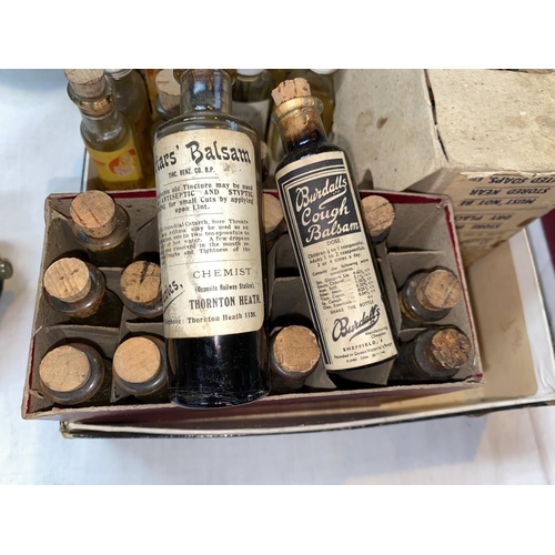 117 - A selection of vintage essence and oil bottles