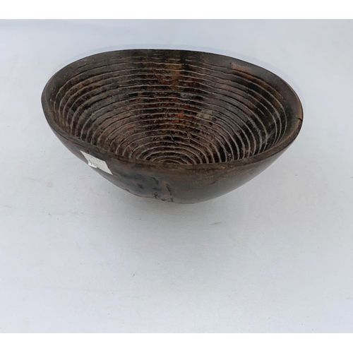 163 - An African tribal rootwood bowl, concentric engraved line decoration, 3 metal stud feet 19 x 18cm