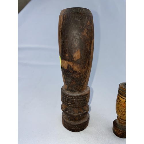 170 - An African carved wood cylindrical cosmetics pot with applicator, carved decoration, 32cm; a similar... 