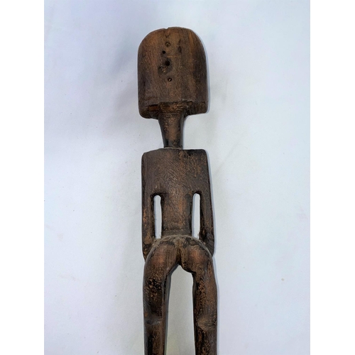 171 - An African tribal (carved) wood female figure, black stained finish, 34cm