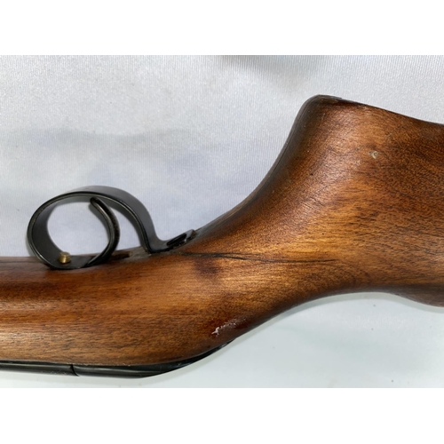 383 - An air rifle with wooden stock stamped CA42717