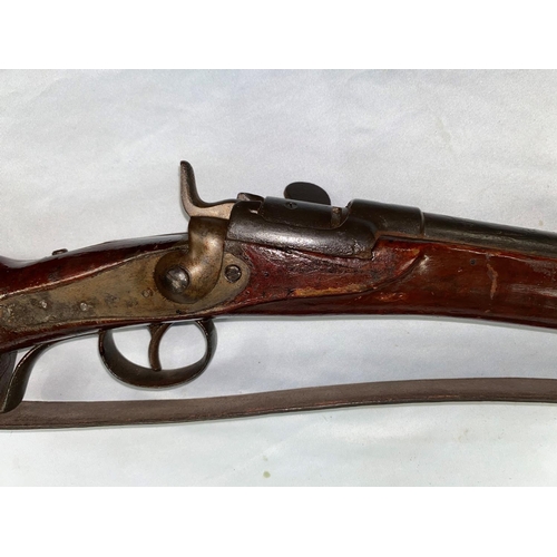 388 - A Belgian breech loading obsolete calibre rifle with rolling loading chamber, stock numbered 873, le... 