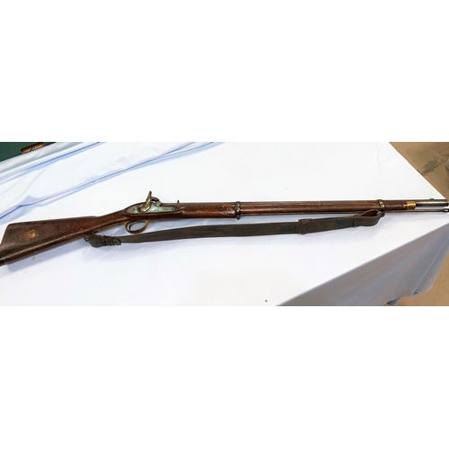 389 - An antique percussion cap rifle with lock marked Tower 1860 with crown V R mark, length 120cm